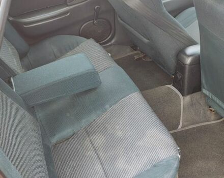 Красный Мазда 323, объемом двигателя 1.5 л и пробегом 270 тыс. км за 1500 $, фото 4 на Automoto.ua