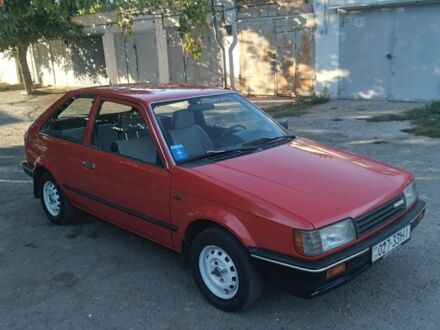 Красный Мазда 323, объемом двигателя 0 л и пробегом 240 тыс. км за 1400 $, фото 1 на Automoto.ua