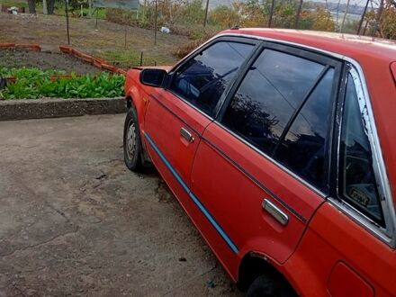 Мазда 323 1987 в Николаеве на Automoto.ua Красный Мазда 323, объемом двигателя 1.7 л и пробегом 370 тыс. км за 450 $, фото 1 на Automoto.ua
