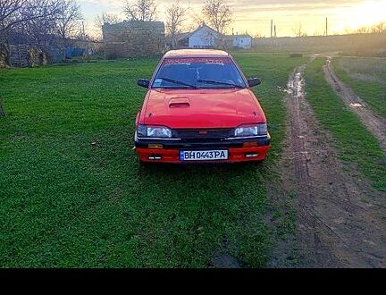 Красный Мазда 323, объемом двигателя 1.3 л и пробегом 0 тыс. км за 700 $, фото 1 на Automoto.ua