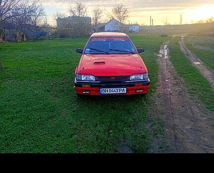 Червоний Мазда 323, об'ємом двигуна 1.3 л та пробігом 0 тис. км за 700 $, фото 1 на Automoto.ua