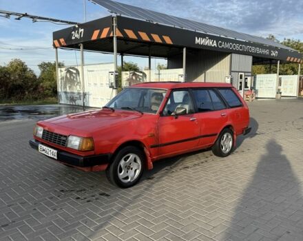 Красный Мазда 323, объемом двигателя 0 л и пробегом 250 тыс. км за 600 $, фото 1 на Automoto.ua
