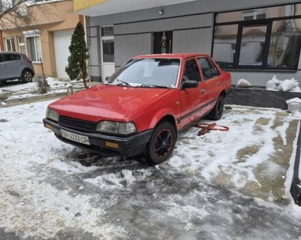 Красный Мазда 323, объемом двигателя 1.3 л и пробегом 333 тыс. км за 738 $, фото 1 на Automoto.ua