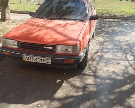 Красный Мазда 323, объемом двигателя 1.3 л и пробегом 2 тыс. км за 715 $, фото 1 на Automoto.ua