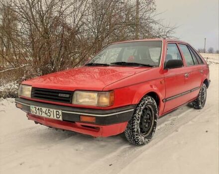 Красный Мазда 323, объемом двигателя 1.3 л и пробегом 250 тыс. км за 1200 $, фото 1 на Automoto.ua