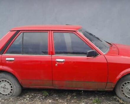 Червоний Мазда 323, об'ємом двигуна 1.5 л та пробігом 260 тис. км за 600 $, фото 1 на Automoto.ua