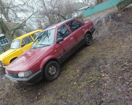 Красный Мазда 323, объемом двигателя 0 л и пробегом 229 тыс. км за 1066 $, фото 1 на Automoto.ua