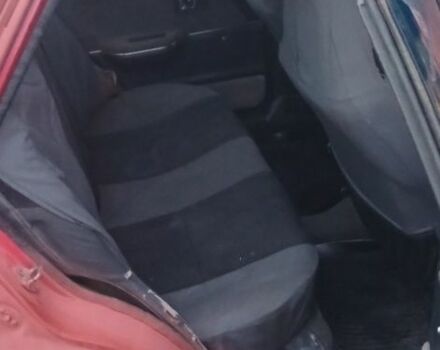 Красный Мазда 323, объемом двигателя 1.3 л и пробегом 2 тыс. км за 952 $, фото 1 на Automoto.ua