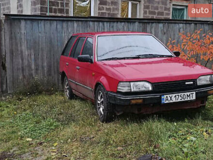Червоний Мазда 323, об'ємом двигуна 1.49 л та пробігом 350 тис. км за 900 $, фото 1 на Automoto.ua