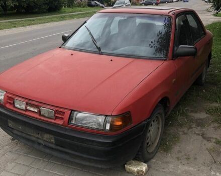 Червоний Мазда 323, об'ємом двигуна 1.7 л та пробігом 300 тис. км за 700 $, фото 1 на Automoto.ua