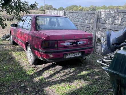 Красный Мазда 323, объемом двигателя 1.4 л и пробегом 300 тыс. км за 785 $, фото 1 на Automoto.ua
