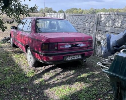 Красный Мазда 323, объемом двигателя 1.4 л и пробегом 300 тыс. км за 785 $, фото 1 на Automoto.ua