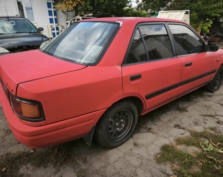 Красный Мазда 323, объемом двигателя 1.6 л и пробегом 500 тыс. км за 400 $, фото 1 на Automoto.ua