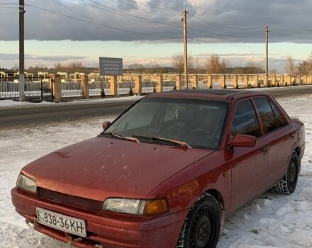 Красный Мазда 323, объемом двигателя 1.6 л и пробегом 1 тыс. км за 650 $, фото 1 на Automoto.ua