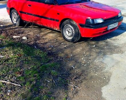 Красный Мазда 323, объемом двигателя 1.6 л и пробегом 348 тыс. км за 1600 $, фото 1 на Automoto.ua