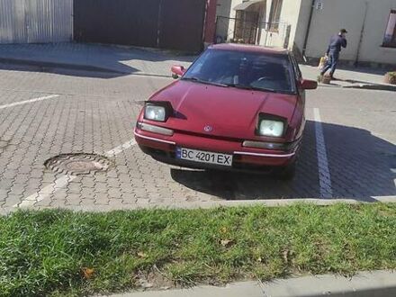 Мазда 323 1991 у Городке на Automoto.ua Червоний Мазда 323, об'ємом двигуна 1.6 л та пробігом 306 тис. км за 2300 $, фото 1 на Automoto.ua