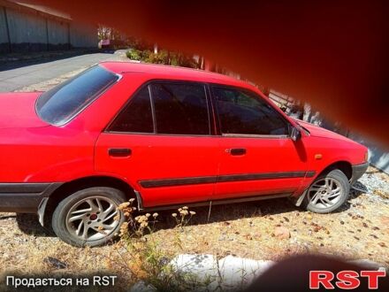 Мазда 323 1992 у Подільськ (Котовськ) на Automoto.ua Червоний Мазда 323, об'ємом двигуна 1.3 л та пробігом 300 тис. км за 700 $, фото 1 на Automoto.ua