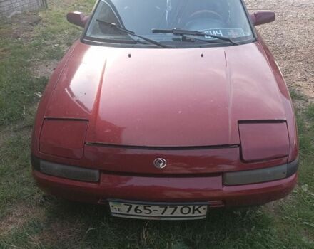Красный Мазда 323, объемом двигателя 2 л и пробегом 400 тыс. км за 1500 $, фото 1 на Automoto.ua