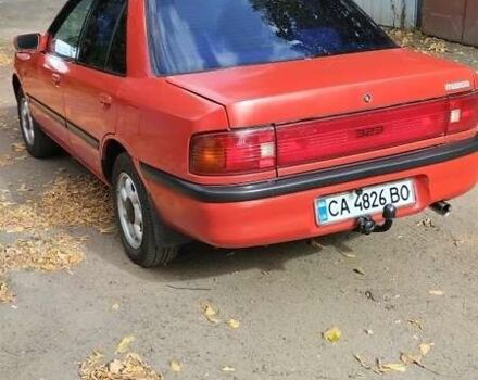 Червоний Мазда 323, об'ємом двигуна 1.3 л та пробігом 300 тис. км за 1850 $, фото 1 на Automoto.ua