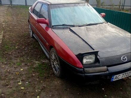 Красный Мазда 323, объемом двигателя 1.6 л и пробегом 200 тыс. км за 500 $, фото 1 на Automoto.ua
