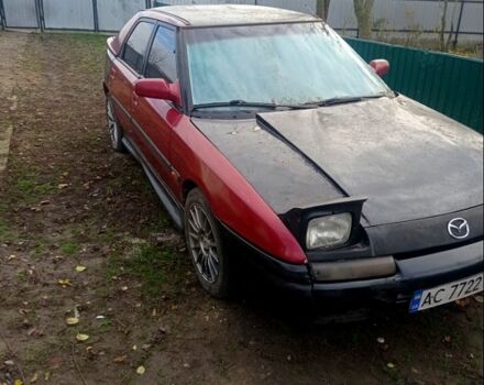 Красный Мазда 323, объемом двигателя 1.6 л и пробегом 200 тыс. км за 500 $, фото 1 на Automoto.ua