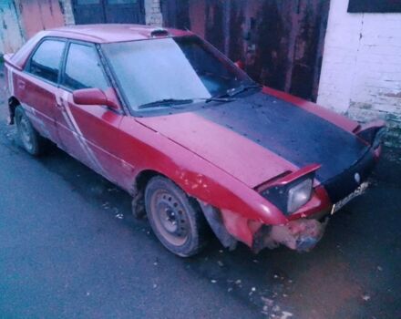 Красный Мазда 323, объемом двигателя 1.6 л и пробегом 999 тыс. км за 500 $, фото 1 на Automoto.ua