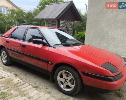 Червоний Мазда 323, об'ємом двигуна 1.6 л та пробігом 317 тис. км за 1550 $, фото 1 на Automoto.ua