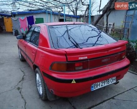 Червоний Мазда 323, об'ємом двигуна 1.6 л та пробігом 537 тис. км за 1300 $, фото 1 на Automoto.ua