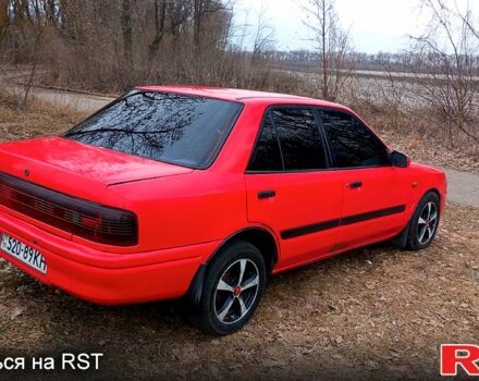 Красный Мазда 323, объемом двигателя 1.3 л и пробегом 222 тыс. км за 1000 $, фото 1 на Automoto.ua