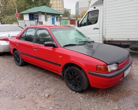 Красный Мазда 323, объемом двигателя 1.6 л и пробегом 260 тыс. км за 1000 $, фото 1 на Automoto.ua