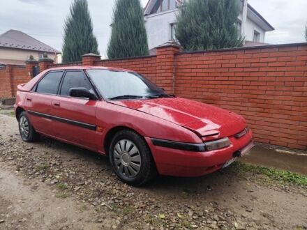 Червоний Мазда 323, об'ємом двигуна 6 л та пробігом 130 тис. км за 1500 $, фото 1 на Automoto.ua
