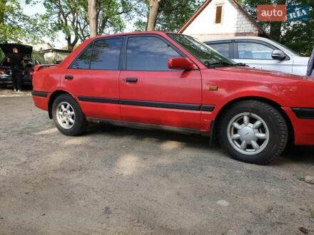 Мазда 323 1993 у Тульчине на Automoto.ua Червоний Мазда 323, об'ємом двигуна 1.5 л та пробігом 339 тис. км за 1900 $, фото 1 на Automoto.ua