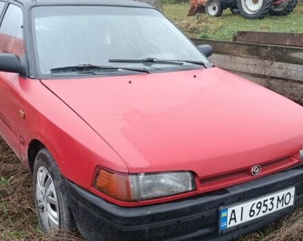 Красный Мазда 323, объемом двигателя 1.3 л и пробегом 300 тыс. км за 475 $, фото 1 на Automoto.ua