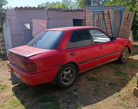 Красный Мазда 323, объемом двигателя 1.6 л и пробегом 3 тыс. км за 725 $, фото 1 на Automoto.ua
