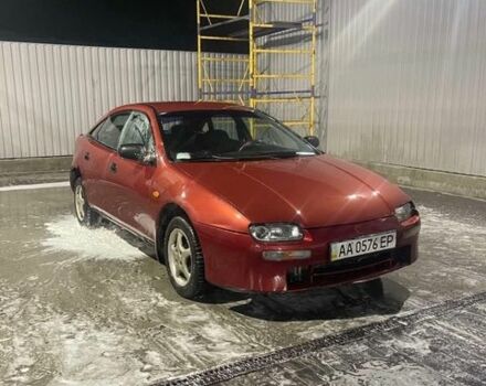 Красный Мазда 323, объемом двигателя 1.49 л и пробегом 377 тыс. км за 1000 $, фото 1 на Automoto.ua