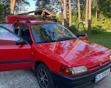 Красный Мазда 323, объемом двигателя 1.6 л и пробегом 220 тыс. км за 1800 $, фото 1 на Automoto.ua