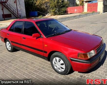 Червоний Мазда 323, об'ємом двигуна 1.3 л та пробігом 200 тис. км за 1350 $, фото 1 на Automoto.ua