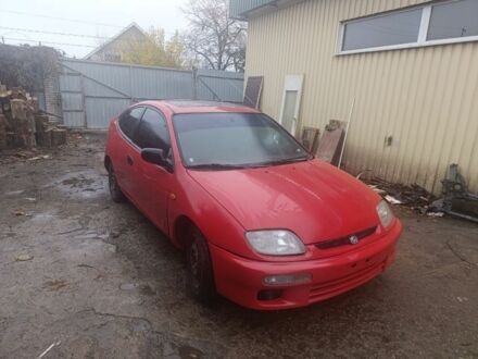 Червоний Мазда 323, об'ємом двигуна 1.5 л та пробігом 320 тис. км за 2300 $, фото 1 на Automoto.ua