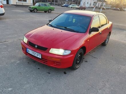Мазда 323 1995 в Барышевке на Automoto.ua Красный Мазда 323, объемом двигателя 1.5 л и пробегом 400 тыс. км за 2000 $, фото 1 на Automoto.ua