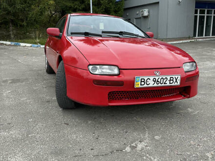 Красный Мазда 323, объемом двигателя 1.49 л и пробегом 450 тыс. км за 2000 $, фото 1 на Automoto.ua
