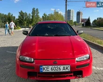 Красный Мазда 323, объемом двигателя 1.5 л и пробегом 426 тыс. км за 2300 $, фото 1 на Automoto.ua
