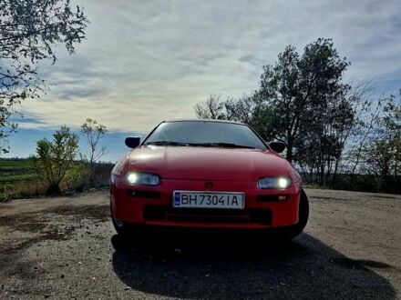 Красный Мазда 323, объемом двигателя 1.84 л и пробегом 303 тыс. км за 2650 $, фото 1 на Automoto.ua