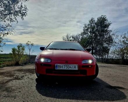 Червоний Мазда 323, об'ємом двигуна 1.84 л та пробігом 303 тис. км за 2650 $, фото 1 на Automoto.ua