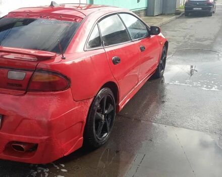 Червоний Мазда 323, об'ємом двигуна 2 л та пробігом 300 тис. км за 800 $, фото 1 на Automoto.ua