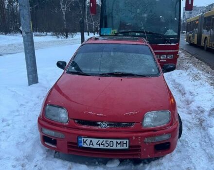 Красный Мазда 323, объемом двигателя 1.5 л и пробегом 320 тыс. км за 2200 $, фото 1 на Automoto.ua