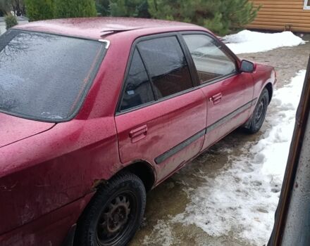 Красный Мазда 323, объемом двигателя 1 л и пробегом 270 тыс. км за 903 $, фото 1 на Automoto.ua