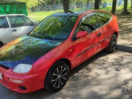 Мазда 323 1995 у Харкові на Automoto.ua Червоний Мазда 323, об'ємом двигуна 1.3 л та пробігом 300 тис. км за 1800 $, фото 1 на Automoto.ua