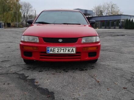 Червоний Мазда 323, об'ємом двигуна 1.5 л та пробігом 290 тис. км за 2800 $, фото 1 на Automoto.ua