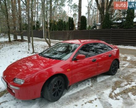 Красный Мазда 323, объемом двигателя 1.5 л и пробегом 416 тыс. км за 2500 $, фото 1 на Automoto.ua