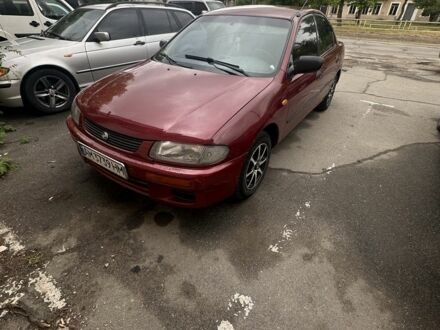Мазда 323 1996 в Херсоне на Automoto.ua Красный Мазда 323, объемом двигателя 1.5 л и пробегом 250 тыс. км за 2500 $, фото 1 на Automoto.ua